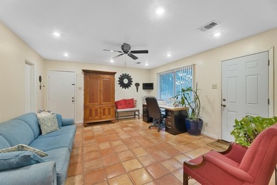 Beautiful modern hacienda-style home backing to a lush greenbelt