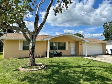 Move-in ready and priced to sell: this 3-bedroom, 2-bath block - photo 2