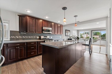 Waterfront living at its finest! This elevated and updated 2Br - photo 2