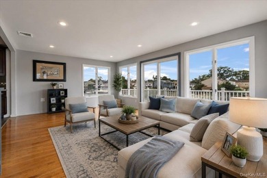 Waterfront living at its finest! This elevated and updated 2Br - photo 3