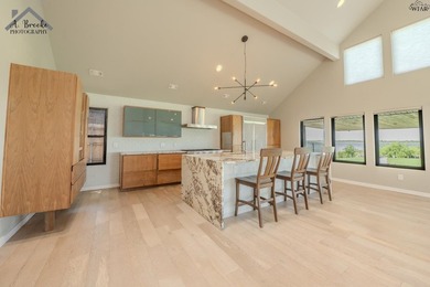 Unique modern lakefront home featuring 3 bedrooms, 2 full baths - photo 12