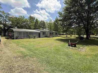 This country home, situated on nearly half an acre, has it all - photo 3
