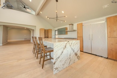 Unique modern lakefront home featuring 3 bedrooms, 2 full baths - photo 14