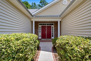 Enjoy serene pond and 7th fairway views from this beautifully - photo 3