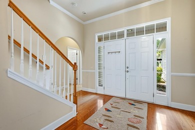 Enjoy serene pond and 7th fairway views from this beautifully - photo 4