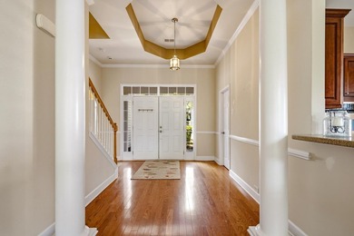 Enjoy serene pond and 7th fairway views from this beautifully - photo 5