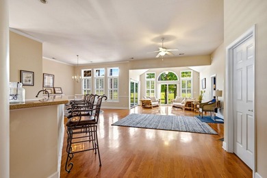 Enjoy serene pond and 7th fairway views from this beautifully - photo 7