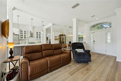 THIS BEAUTIFULLY UPDATED THREE-BEDROOM HOME IN OSPREY COVE IS - photo 11