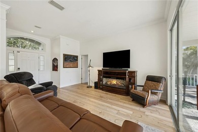 THIS BEAUTIFULLY UPDATED THREE-BEDROOM HOME IN OSPREY COVE IS - photo 13