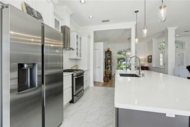 THIS BEAUTIFULLY UPDATED THREE-BEDROOM HOME IN OSPREY COVE IS - photo 20