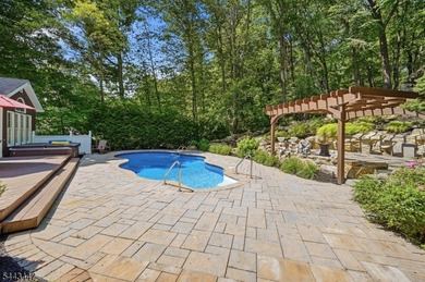 Welcome to this custom built center hall colonial located in the - photo 30