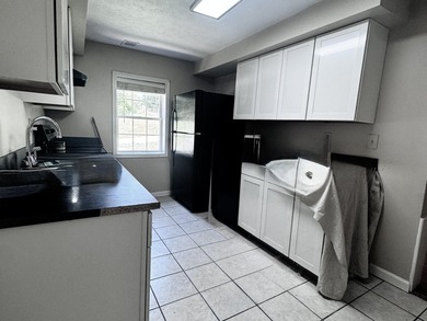Welcome home to this spacious 4-bedroom, 2-bath residence - photo 4