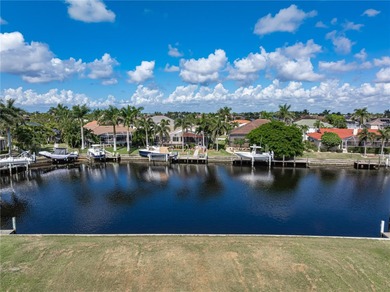 VACANT, WATERFRONT LOT IN BURNT STORE ISLES - This oversized - photo 2