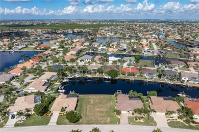 VACANT, WATERFRONT LOT IN BURNT STORE ISLES - This oversized - photo 7