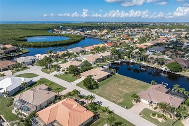 VACANT, WATERFRONT LOT IN BURNT STORE ISLES - This oversized - photo 8