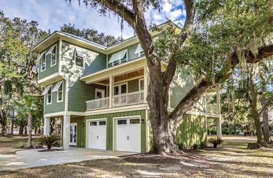 Nestled beneath a breathtaking canopy of centuries-old live oaks - photo 2