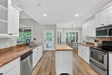 Welcome to this beautifully updated and meticulously maintained - photo 12