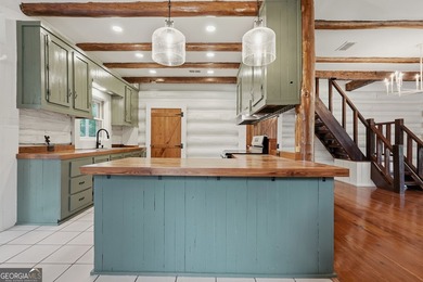 * 3BR / 2BA 1,635-SF Log Cabin built in 1992 and totally - photo 13