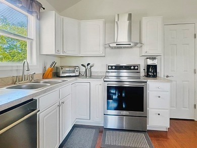 Stunning views of Powell Creek greet you as you walk inside this - photo 14