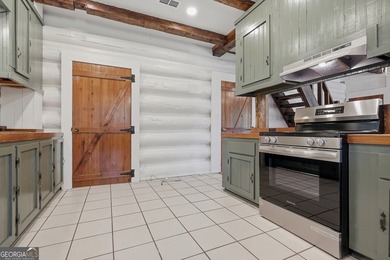 * 3BR / 2BA 1,635-SF Log Cabin built in 1992 and totally - photo 16