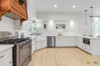 This mid-century cottage has been tastefully updated to include - photo 9