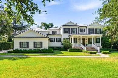 Nestled beneath a canopy of majestic live oaks within the - photo 1