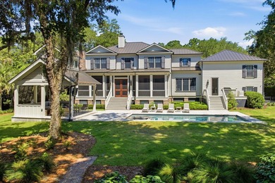 Nestled beneath a canopy of majestic live oaks within the - photo 2