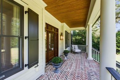 Nestled beneath a canopy of majestic live oaks within the - photo 7