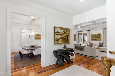 Nestled beneath a canopy of majestic live oaks within the - photo 10