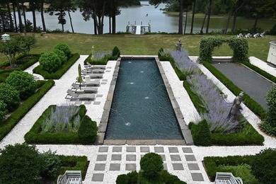 Majestically perched atop a high bluff on 2.31 acres at the head - photo 11