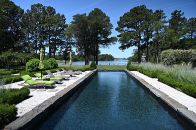 Majestically perched atop a high bluff on 2.31 acres at the head - photo 12