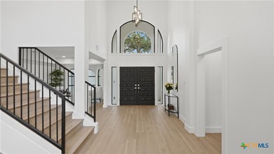 Welcome to 8711 Deer Leap, an extraordinary luxury estate on a - photo 5
