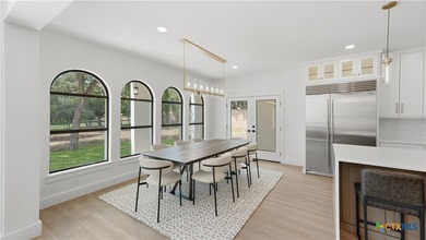 Welcome to 8711 Deer Leap, an extraordinary luxury estate on a - photo 10
