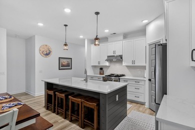 Welcome home to The Pointe at Rhodes Crossing, where modern - photo 10