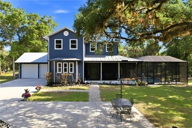 This beautifully renovated two-story estate is set on 6.2 acres - photo 1