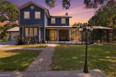 This beautifully renovated two-story estate is set on 6.2 acres - photo 3