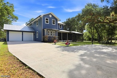 This beautifully renovated two-story estate is set on 6.2 acres - photo 5