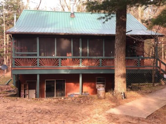 DESIRABLE PERE MARQUETTE RIVER LOCATION! - Lake Home For Sale in Branch, Michigan