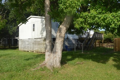 This .15-acre lot is nestled in a popular neighborhood of - photo 1