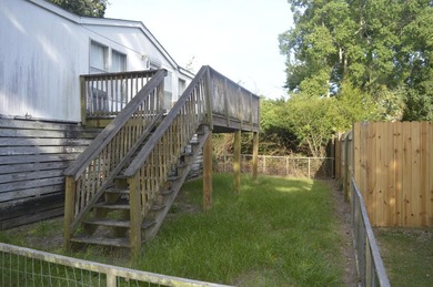 This .15-acre lot is nestled in a popular neighborhood of - photo 2