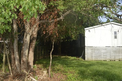 This .15-acre lot is nestled in a popular neighborhood of - photo 3