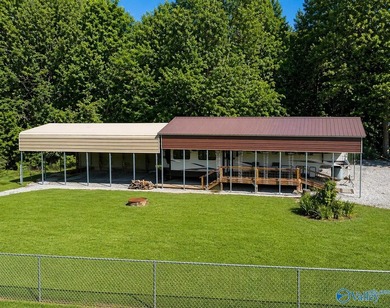 Your lake oasis awaits! No lot rent! No HOA fees! This 0.41 acre - photo 1