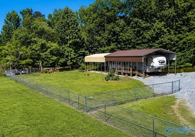 Your lake oasis awaits! No lot rent! No HOA fees! This 0.41 acre - photo 2