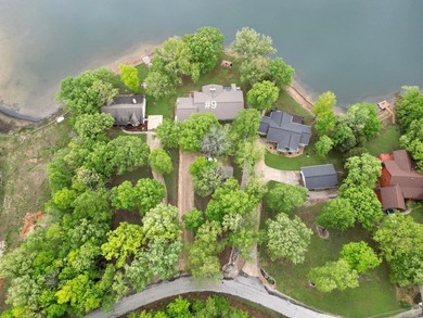This one level well maintained and furnished Lake Omaha home is - photo 3