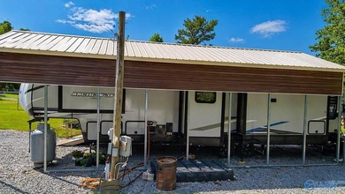 Your lake oasis awaits! No lot rent! No HOA fees! This 0.41 acre - photo 3