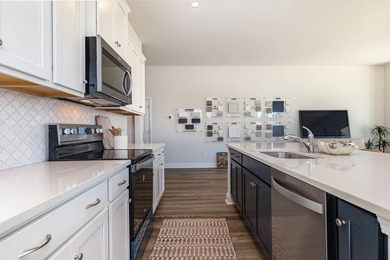 This Eaton home is a chef and entertainer's dream! With a large - photo 7