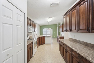 Welcome home to this impeccably kept home in a 55+ gated - photo 13