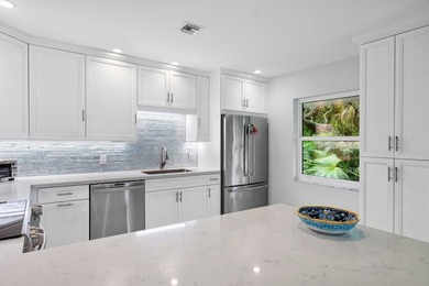 Beautifully renovated 2 bedroom Corner 2nd floor condo with Golf - photo 16