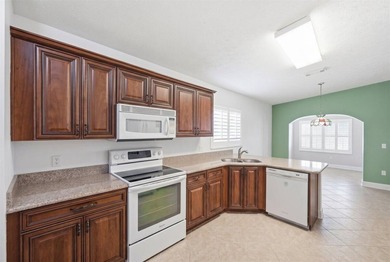 Welcome home to this impeccably kept home in a 55+ gated - photo 16