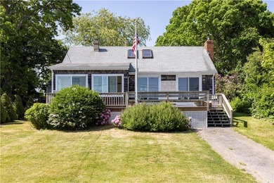 Nestled on desirable Harbour Island, this charming shingle-style - photo 3